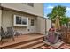 Backyard patio with barbeque, chairs and shade at 14396 E Temple Pl # D, Aurora, CO 80015