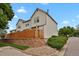 Well-maintained home with a retaining wall and landscaping, showcasing curb appeal and neighborhood charm at 14396 E Temple Pl # D, Aurora, CO 80015