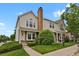 Charming two-story townhome with a well-maintained front yard and brick chimney at 14396 E Temple Pl # D, Aurora, CO 80015
