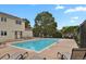 Sparkling outdoor pool with ample lounge seating, perfect for relaxation and summer enjoyment at 14396 E Temple Pl # D, Aurora, CO 80015