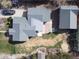 Aerial view of a well-maintained property showing the roof, yard, and driveway at 25 Kendall St, Lakewood, CO 80226