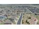 A stunning aerial view showcasing modern homes within a well-designed neighborhood and green spaces at 2177 Shadow Creek Dr, Castle Rock, CO 80104