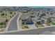 Aerial view of a two-story home, spacious driveway, and well-kept lawn in a neighborhood at 2177 Shadow Creek Dr, Castle Rock, CO 80104