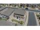 An aerial view that showcases the landscaped backyard with patio of a well-maintained home at 2177 Shadow Creek Dr, Castle Rock, CO 80104