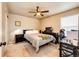 A cozy bedroom with a ceiling fan and neutral tones, perfect for relaxing and unwinding at 2177 Shadow Creek Dr, Castle Rock, CO 80104