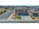 Two-story home with stone accents, spacious driveway, and landscaped front yard in a Gathering-friendly neighborhood at 2177 Shadow Creek Dr, Castle Rock, CO 80104
