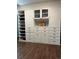 Built in closet system with shelving, drawers and cabinets at 1618 Garnet St, Broomfield, CO 80020