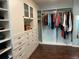 Spacious walk-in closet with plenty of hanging storage and shelves at 1618 Garnet St, Broomfield, CO 80020