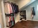 Well-organized walk-in closet with hanging racks and shoe storage at 1618 Garnet St, Broomfield, CO 80020