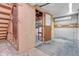Unfinished basement area with utility connections and exposed beams at 8259 Nola Dr, Denver, CO 80221