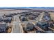 A suburban neighborhood surrounds the house and sits in front of a mountain range at 3925 W 149Th Ave, Broomfield, CO 80023