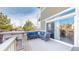 Relaxing outdoor patio with a stylish sectional sofa and seamless access to the interior at 3925 W 149Th Ave, Broomfield, CO 80023
