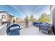 Inviting outdoor deck with comfortable seating and a built-in grill at 3925 W 149Th Ave, Broomfield, CO 80023