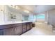 Luxurious main bathroom featuring double sinks, a soaking tub, and a separate glass shower at 3925 W 149Th Ave, Broomfield, CO 80023