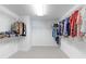 Spacious walk-in closet with ample shelving and storage space for clothing and accessories, well-lit at 3925 W 149Th Ave, Broomfield, CO 80023