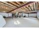 Unfinished basement offers potential for customization, with visible utilities and ample open space at 6673 Mentha Dr, Castle Rock, CO 80108