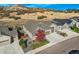 Beautiful two-story home with well-maintained landscaping and a three-car garage in a quiet area at 6673 Mentha Dr, Castle Rock, CO 80108