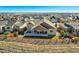Expansive backyard and covered patio area perfect for outdoor entertaining in a suburban neighborhood at 6673 Mentha Dr, Castle Rock, CO 80108