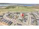 Aerial view of a residential neighborhood, highlighting the surrounding natural landscape at 11464 Stonewash St, Littleton, CO 80125