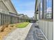 Paver patio with putting green and hot tub in a fenced backyard offers outdoor enjoyment at 11464 Stonewash St, Littleton, CO 80125