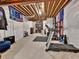 Unfinished basement with gym equipment and storage areas at 11464 Stonewash St, Littleton, CO 80125