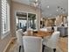 Cozy dining room with sliding glass doors and seamless flow to the living areas at 11464 Stonewash St, Littleton, CO 80125
