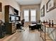Comfortable home office space with built in desk and bright windows at 11464 Stonewash St, Littleton, CO 80125