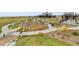 Community playground featuring rock border, padded floor, and an array of climbing structures in a shared neighborhood space at 11464 Stonewash St, Littleton, CO 80125