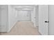 Finished basement featuring carpeted floors and multiple doorways, offering versatile space at 9123 W Arbor Ave, Littleton, CO 80123