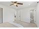Neutral bedroom with two open doorways at 9123 W Arbor Ave, Littleton, CO 80123