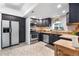 Cozy kitchen featuring stainless steel appliances and granite countertops at 404 S Jasmine St, Denver, CO 80224