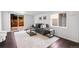 Bright living room featuring an outdoor access, modern furnishings, and neutral decor and fixtures at 404 S Jasmine St, Denver, CO 80224