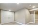Finished basement features neutral carpet, fresh paint, and closet at 4293 Graham Ct, Boulder, CO 80305