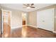 Bedroom boasts hardwood floors, ceiling fan, closet, and ensuite access at 4293 Graham Ct, Boulder, CO 80305