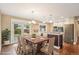 Bright dining room with backyard access, seamlessly connected to the modern kitchen at 4293 Graham Ct, Boulder, CO 80305