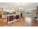 Bright and modern kitchen featuring a large island, stainless steel appliances, and ample cabinet space at 4293 Graham Ct, Boulder, CO 80305