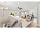 Bright living room with modern furnishings, fan, recessed lighting and stylish decor at 1655 Yates St, Denver, CO 80204