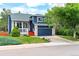 Charming two-story home featuring a well-maintained lawn and a two car garage at 4257 S Andes Way, Aurora, CO 80013