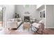 Bright living room with high ceilings, contemporary decor, and comfortable seating at 4257 S Andes Way, Aurora, CO 80013