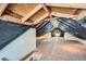 Unfinished attic space, with plywood flooring and exposed beams at 3427 W 29Th Ave, Denver, CO 80211