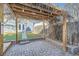 Charming backyard patio area with brick pavers, wooden pergola, and string lights perfect for outdoor entertaining at 3427 W 29Th Ave, Denver, CO 80211
