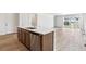 Kitchen island with stainless steel dishwasher at 18951 E 96Th Pl, Commerce City, CO 80022