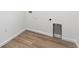 Newer laundry room features hard surface flooring at 18951 E 96Th Pl, Commerce City, CO 80022