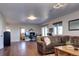 Spacious living room featuring hardwood floors and comfortable seating area at 1391 S Winston Dr, Golden, CO 80401