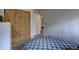 Bedroom featuring a closet with a curtain, neutral-toned walls, and a cozy bed at 17912 E Milan Pl, Aurora, CO 80013