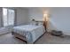 Comfortable bedroom with a large window allowing natural light, creating a relaxing atmosphere at 17912 E Milan Pl, Aurora, CO 80013
