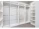 Organized walk-in closet with ample shelving and hanging space at 533 Red Thistle Dr, Highlands Ranch, CO 80126