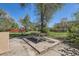 An outdoor dining area with picnic table seating offers room to relax in the backyard at 5475 W 1St Ave, Lakewood, CO 80226