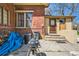 An outdoor patio view with red brick and private entrance at 5475 W 1St Ave, Lakewood, CO 80226