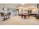 Spacious basement with a pool table, wet bar, and ample room for entertaining guests at 1272 Nightfire Cir, Castle Rock, CO 80104